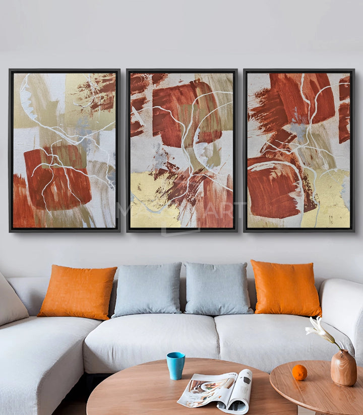 Tableau feuilles blanches fond terracotta mise en situation salon moderne Massinart