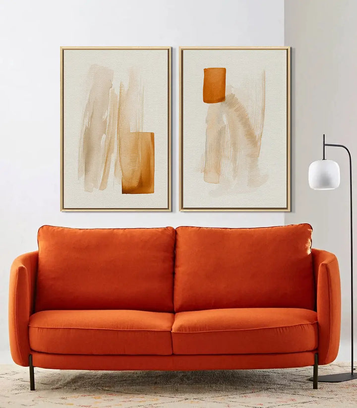 Mise en situation salon moderne — Tableau Sunbaked diptyque au-dessus canapé orange Massinart