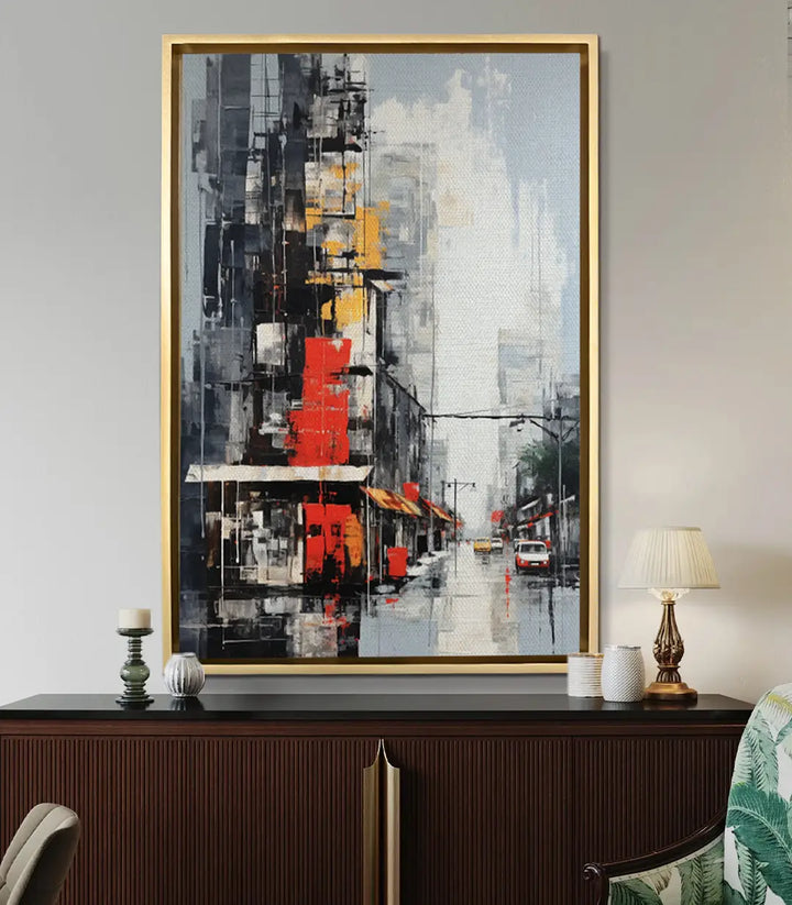 Mise en situation salon moderne, tableau urbain Massinart encadré noir