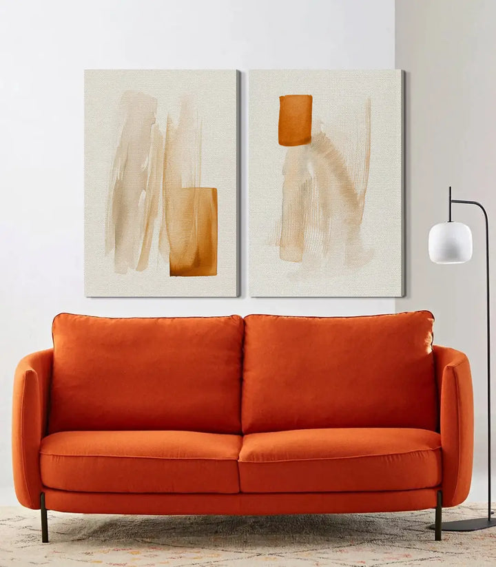 Mise en situation salon moderne — Tableau Sunbaked diptyque au-dessus canapé orange Massinart