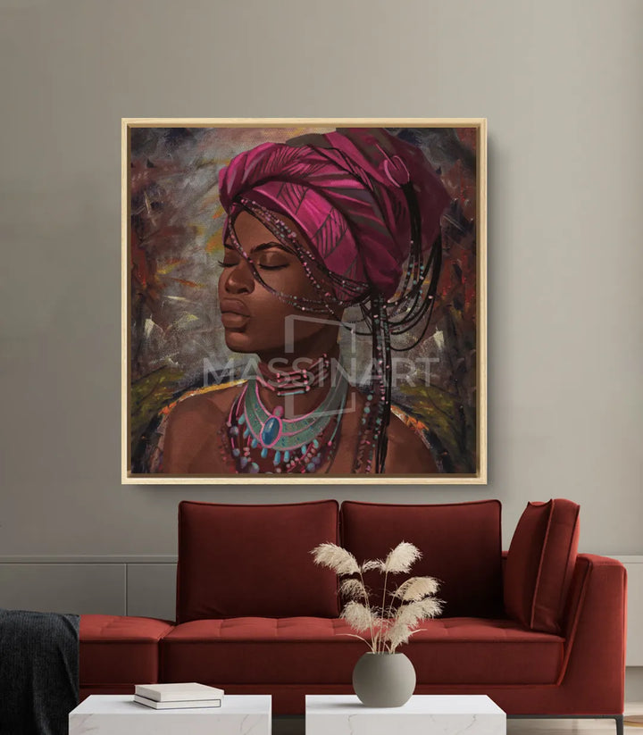 Décoration intérieur contemporain, portrait femme africaine au-dessus canapé bordeaux Massinart
