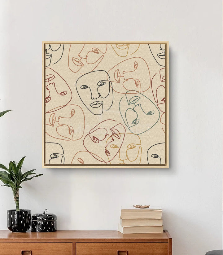 Tableau Faces Massinart — mise en situation salon avec accessoires décoration