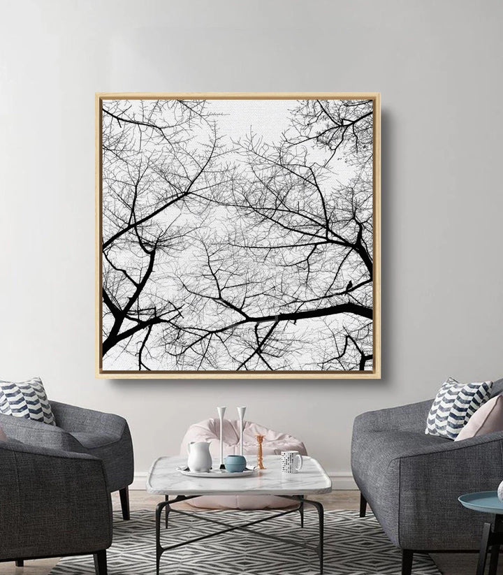Mise en situation salon moderne — Tableau Branches Fade Massinart noir et blanc