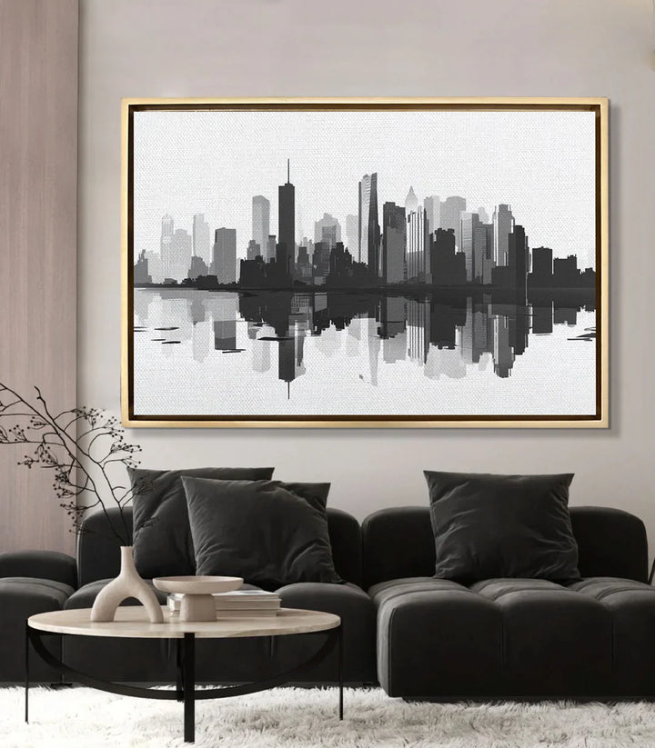 Mise en situation salon moderne — tableau skyline noir blanc au-dessus canapé Massinart