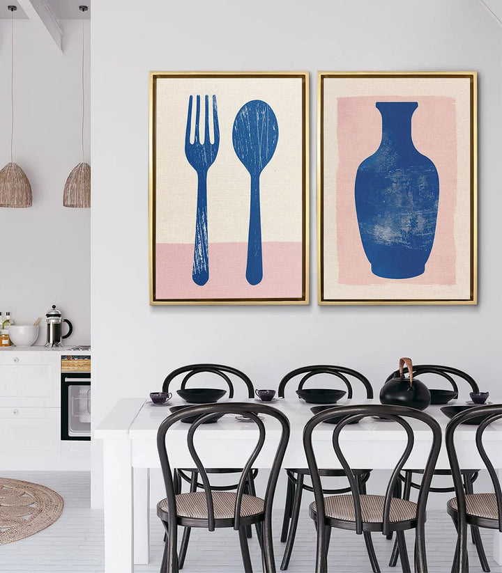 Mise en situation diptyque Elegant Essentials dans salle à manger moderne avec table blanche et chaises noires Massinart