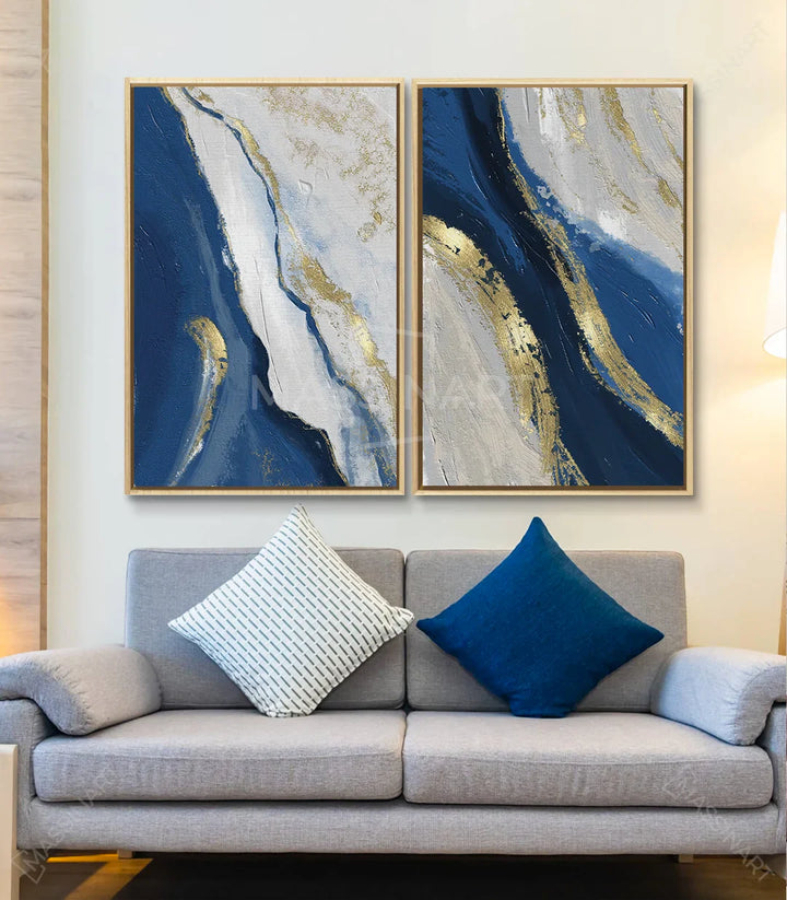 Mise en situation salon moderne avec diptyque Oceans au-dessus du canapé gris