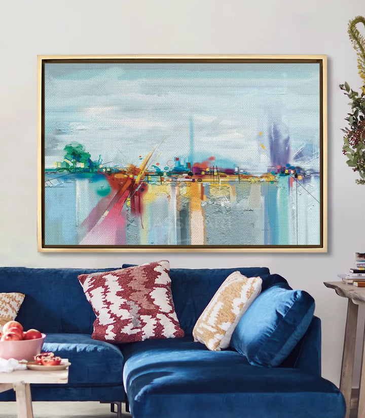 Mise en situation salon moderne, tableau paysage abstrait au-dessus canapé bleu Massinart