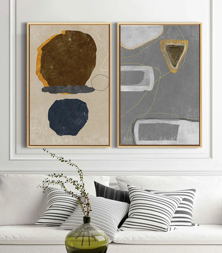 Mise en situation salon moderne Quarry diptyque Massinart — composition abstraite gris et doré
