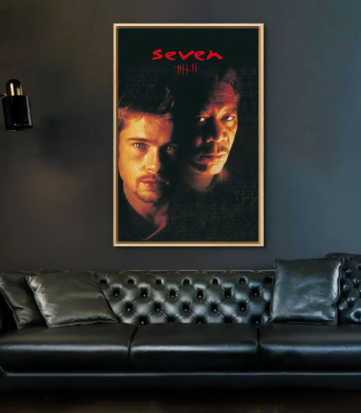 Décoration intérieur contemporain — Affiche Seven Massinart dans un cadre gris au-dessus d'un canapé chesterfield