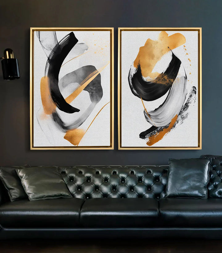 Mise en situation salon moderne — diptyque abstrait noir doré au-dessus canapé cuir, Massinart