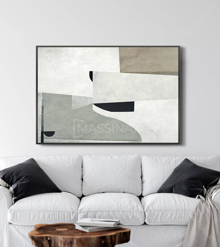Mise en situation salon moderne, tableau abstrait minimaliste au-dessus canapé blanc Massinart