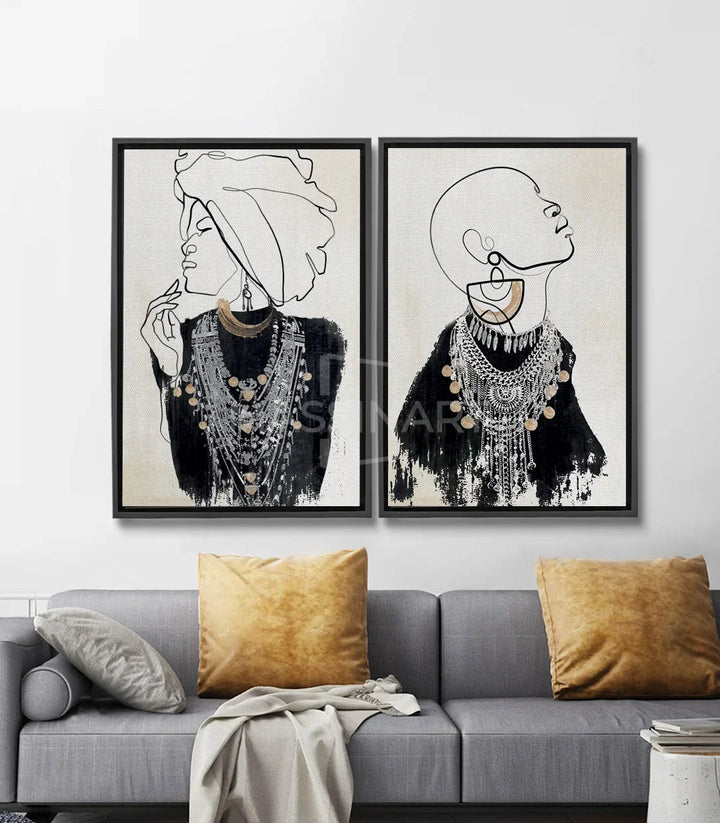 Tableau Jewels of Africa diptyque — deux portraits femmes africaines trait noir, bijoux dorés, fond beige crème Massinart