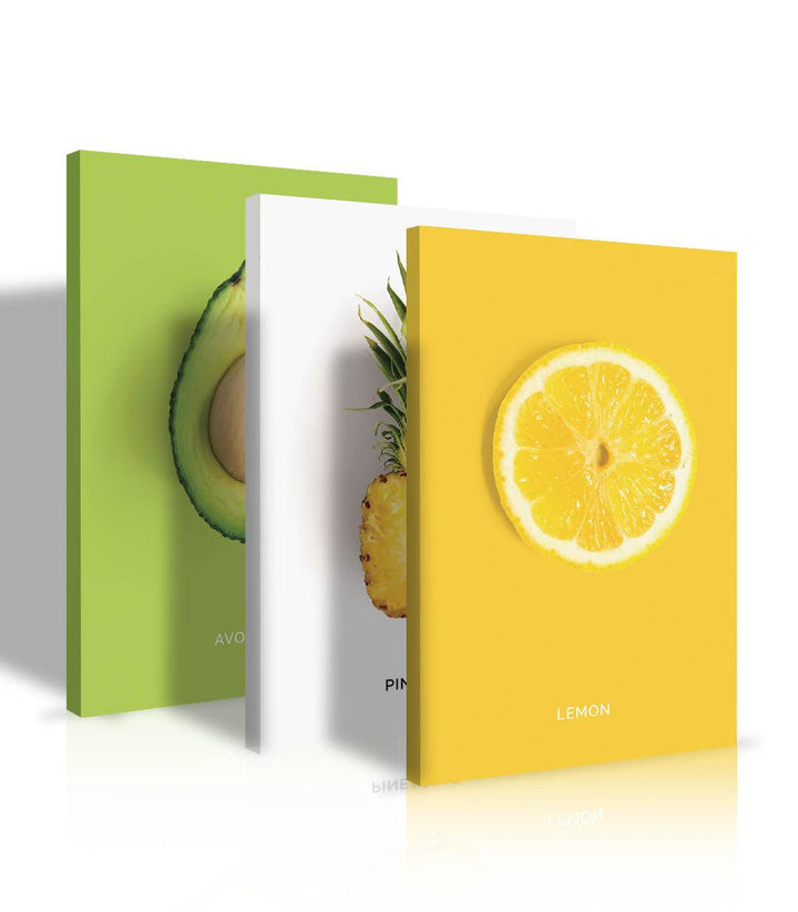 Mise en situation triptyque fruits Massinart — décoration salle à manger scandinave